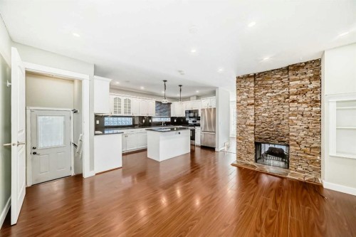 130 Braniff Crescent Sw, Calgary, AB - Indoor With Fireplace