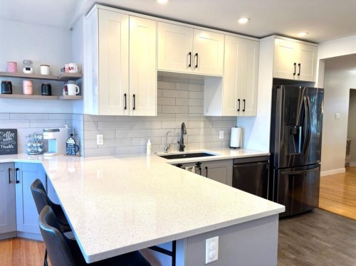 124 Glenpatrick Drive Sw, Calgary, AB - Indoor Photo Showing Kitchen With Upgraded Kitchen