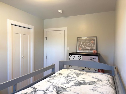 124 Glenpatrick Drive Sw, Calgary, AB - Indoor Photo Showing Bedroom