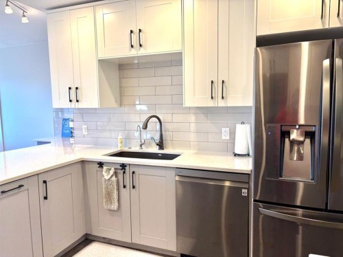 124 Glenpatrick Drive Sw, Calgary, AB - Indoor Photo Showing Kitchen With Upgraded Kitchen