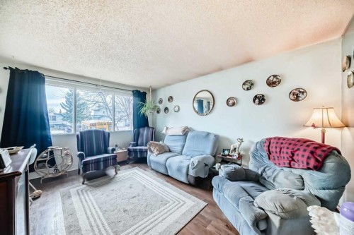 16 Beaver Dam Place Ne, Calgary, AB - Indoor Photo Showing Living Room