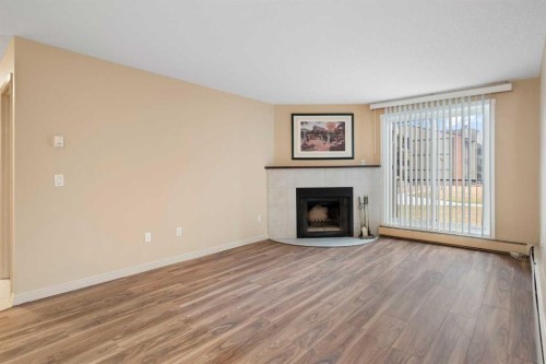 3108-13045 6 Street Sw, Calgary, AB - Indoor Photo Showing Living Room With Fireplace