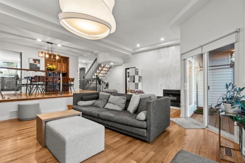 239-4037 42 Street Nw, Calgary, AB - Indoor Photo Showing Living Room With Fireplace