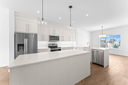 99 Raven Point Se, Calgary, AB - Indoor Photo Showing Kitchen With Stainless Steel Kitchen With Upgraded Kitchen