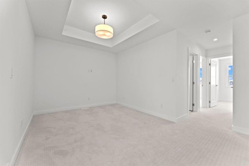 99 Raven Point Se, Calgary, AB - Indoor Photo Showing Other Room