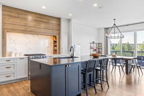 656 Bayview Way Sw, Airdrie, AB - Indoor Photo Showing Kitchen With Upgraded Kitchen