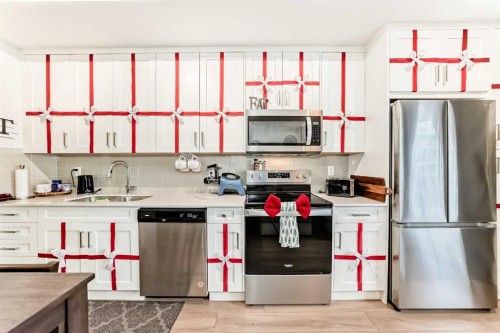 213-500 Auburn Meadows Common Se, Calgary, AB - Indoor Photo Showing Kitchen With Double Sink