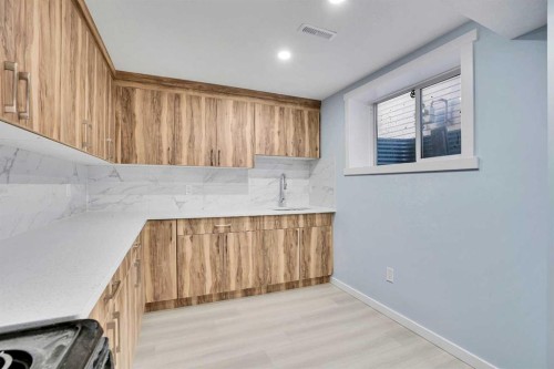 229 Luxstone Way Sw, Airdrie, AB - Indoor Photo Showing Other Room