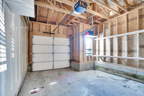 229 Luxstone Way Sw, Airdrie, AB - Indoor Photo Showing Garage