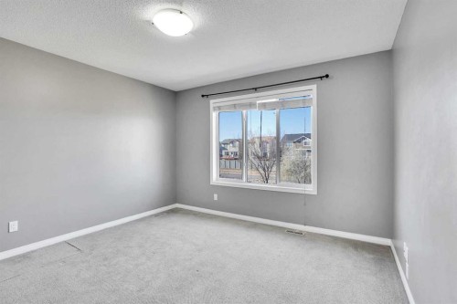 229 Luxstone Way Sw, Airdrie, AB - Indoor Photo Showing Other Room
