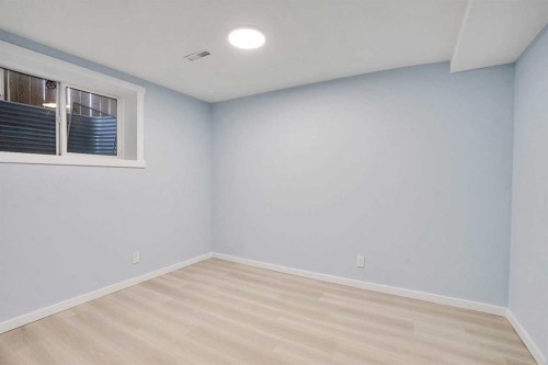 229 Luxstone Way Sw, Airdrie, AB - Indoor Photo Showing Other Room