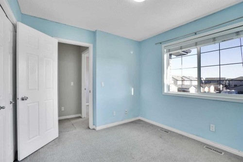 229 Luxstone Way Sw, Airdrie, AB - Indoor Photo Showing Other Room