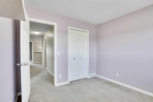229 Luxstone Way Sw, Airdrie, AB - Indoor Photo Showing Other Room