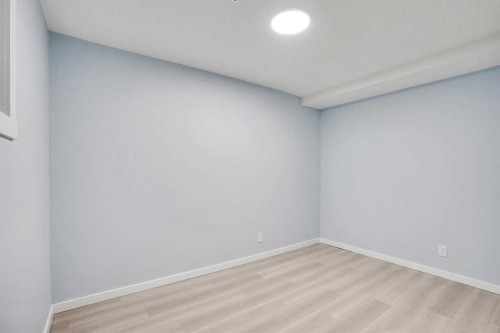 229 Luxstone Way Sw, Airdrie, AB - Indoor Photo Showing Other Room