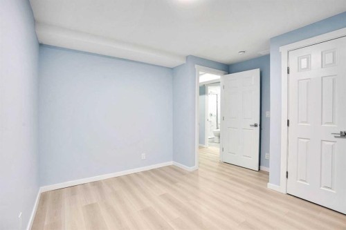 229 Luxstone Way Sw, Airdrie, AB - Indoor Photo Showing Other Room