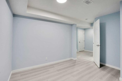 229 Luxstone Way Sw, Airdrie, AB - Indoor Photo Showing Other Room