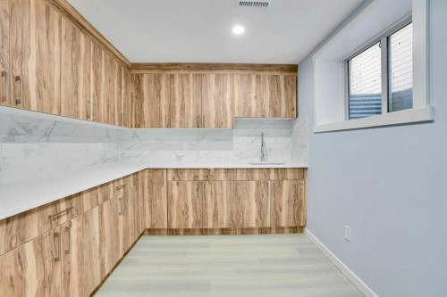 229 Luxstone Way Sw, Airdrie, AB - Indoor Photo Showing Other Room