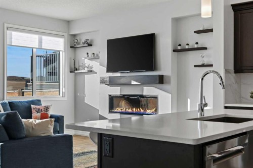 126 Howse Common Ne, Calgary, AB - Indoor With Fireplace