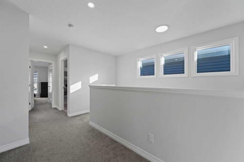 126 Howse Common Ne, Calgary, AB - Indoor Photo Showing Other Room