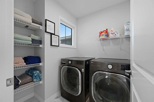 126 Howse Common Ne, Calgary, AB - Indoor Photo Showing Laundry Room