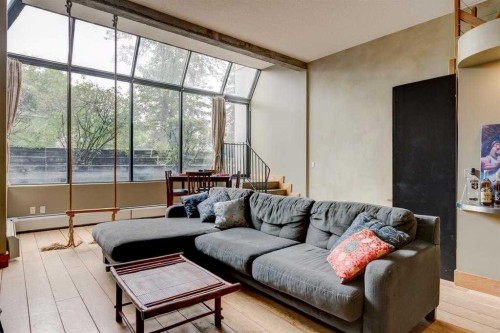 102-59 Glamis Drive Sw, Calgary, AB - Indoor Photo Showing Living Room