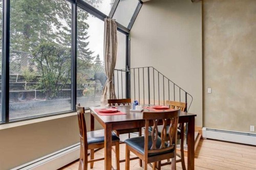 102-59 Glamis Drive Sw, Calgary, AB - Indoor Photo Showing Dining Room