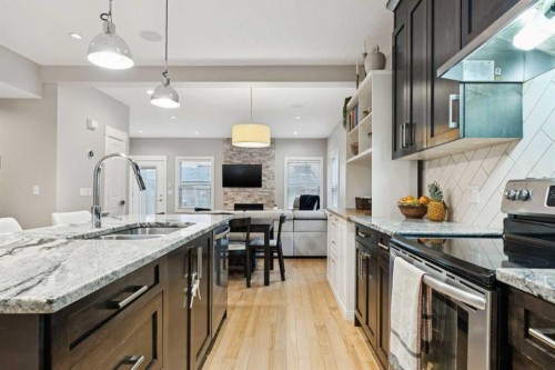 4509 19 Avenue Nw, Calgary, AB - Indoor Photo Showing Kitchen With Double Sink With Upgraded Kitchen