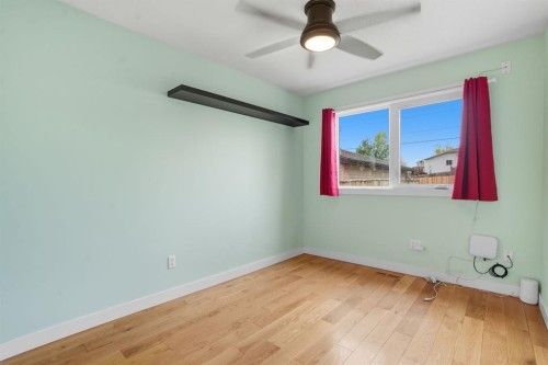 108 Falchurch Crescent Ne, Calgary, AB - Indoor Photo Showing Other Room