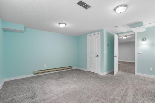 108 Falchurch Crescent Ne, Calgary, AB - Indoor Photo Showing Other Room