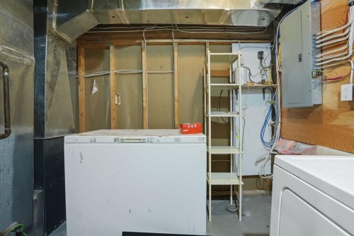 108 Falchurch Crescent Ne, Calgary, AB - Indoor Photo Showing Laundry Room
