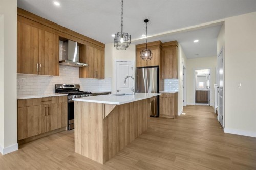 585 Corner Meadows Way Ne, Calgary, AB - Indoor Photo Showing Kitchen With Upgraded Kitchen