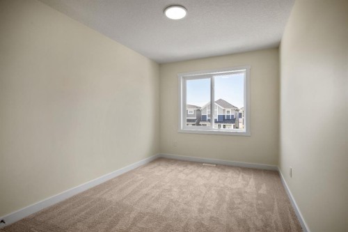 585 Corner Meadows Way Ne, Calgary, AB - Indoor Photo Showing Other Room