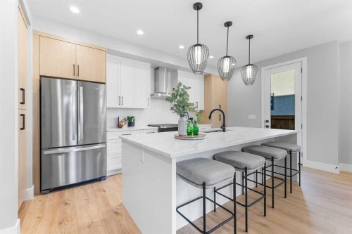 100 West Glen Crescent Sw, Calgary, AB - Indoor Photo Showing Kitchen With Stainless Steel Kitchen With Upgraded Kitchen