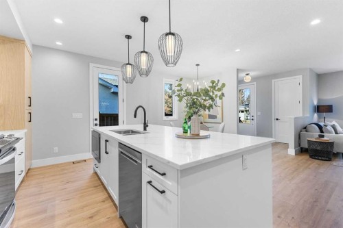 100 West Glen Crescent Sw, Calgary, AB - Indoor Photo Showing Kitchen With Double Sink With Upgraded Kitchen