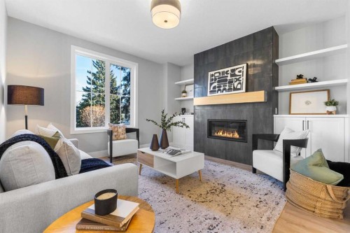 100 West Glen Crescent Sw, Calgary, AB - Indoor Photo Showing Living Room With Fireplace