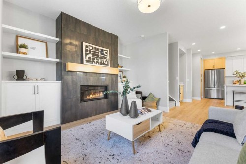 100 West Glen Crescent Sw, Calgary, AB - Indoor Photo Showing Living Room With Fireplace