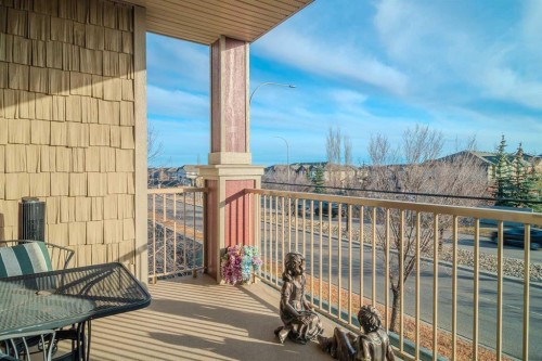 1202-2370 Bayside Road Sw, Airdrie, AB - Outdoor With Deck Patio Veranda With Exterior