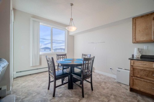 1202-2370 Bayside Road Sw, Airdrie, AB - Indoor Photo Showing Dining Room