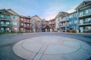 1202-2370 Bayside Road Sw, Airdrie, AB  - Outdoor With Facade 