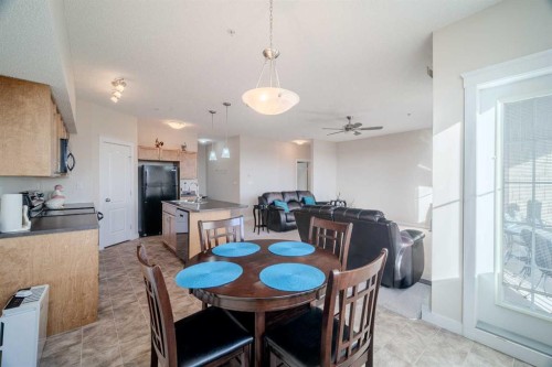 1202-2370 Bayside Road Sw, Airdrie, AB - Indoor Photo Showing Dining Room