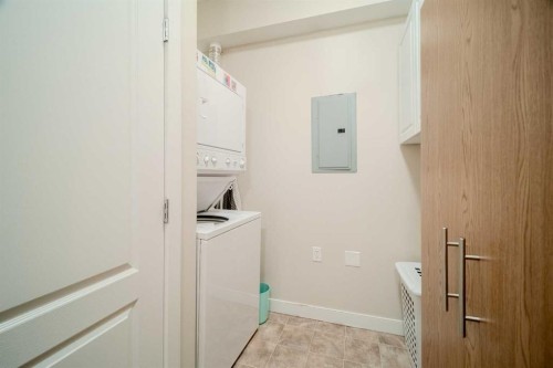 1202-2370 Bayside Road Sw, Airdrie, AB - Indoor Photo Showing Laundry Room