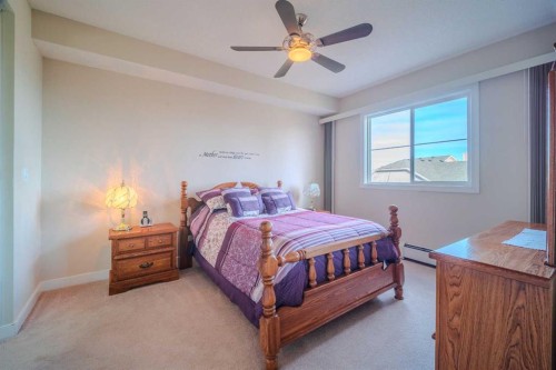 1202-2370 Bayside Road Sw, Airdrie, AB - Indoor Photo Showing Bedroom