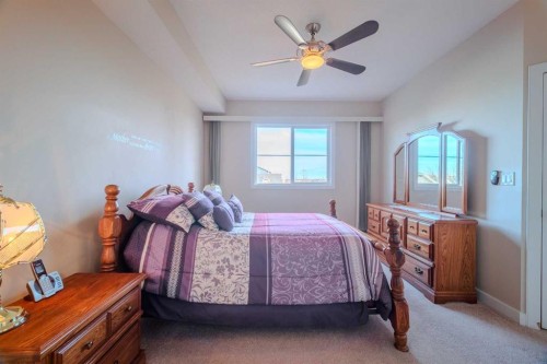 1202-2370 Bayside Road Sw, Airdrie, AB - Indoor Photo Showing Bedroom