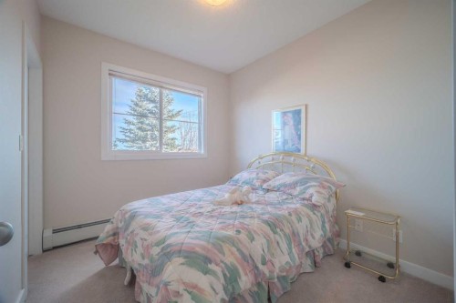 1202-2370 Bayside Road Sw, Airdrie, AB - Indoor Photo Showing Bedroom