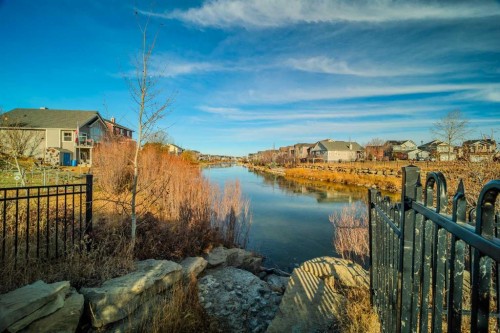 1202-2370 Bayside Road Sw, Airdrie, AB - Outdoor With Body Of Water With View