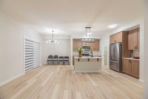 65 Amblefield View Nw, Calgary, AB - Indoor Photo Showing Kitchen With Stainless Steel Kitchen