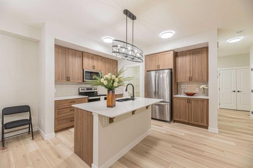 65 Amblefield View Nw, Calgary, AB - Indoor Photo Showing Kitchen With Stainless Steel Kitchen