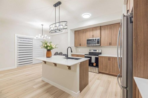 65 Amblefield View Nw, Calgary, AB - Indoor Photo Showing Kitchen With Stainless Steel Kitchen With Upgraded Kitchen