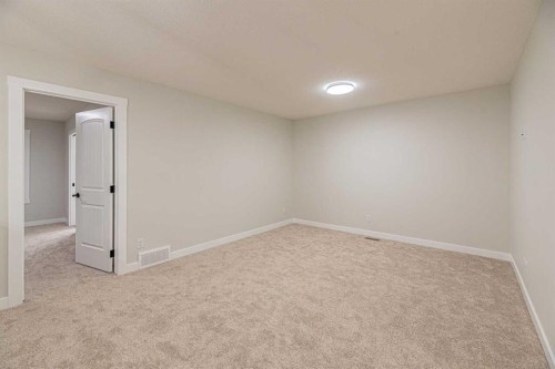 65 Amblefield View Nw, Calgary, AB - Indoor Photo Showing Other Room