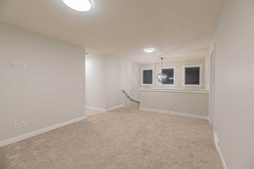 65 Amblefield View Nw, Calgary, AB - Indoor Photo Showing Other Room
